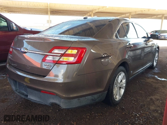 2015 Ford Taurus SEL with VIN 1FAHP2H87FG176103, listed as a IAAI auction lot 41950844 with 205,014 mi miles. Bid and sale history available at carsss.com. Image 4.