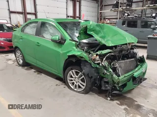 2016 Chevrolet Sonic LT z VIN 1G1JC5SH9G4148526, wystawiony jako IAAI lot #41046863 z przebiegiem Nie podano mil oraz . Historia ofert i sprzedaży dostępna na DreamBid. Obrazek 1.