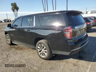 2023 Chevrolet Suburban LT with VIN 1GNSCCKD1PR124986, listed as a Copart auction lot 87432904 with 105,026 mi miles and Salvage Title. Bid and sale history available at DreamBid. Image 2.