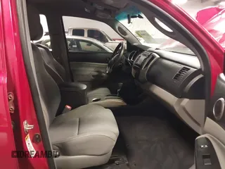 2015 Toyota Tacoma with VIN 3TMLU4EN3FM196518, listed as a IAAI auction lot 41198481 with 96,277 mi miles and . Bid and sale history available at DreamBid. Image 5.