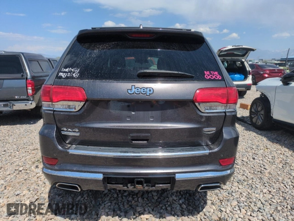 2014 Jeep Grand Cherokee Summit with VIN 1C4RJFJM8EC395169, listed as a Copart auction lot 60637265 with 116,575 mi miles and Salvage title. Bid and sale history available at DreamBid. Image 6.