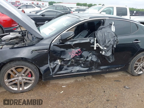 2013 Kia Optima SX with VIN 5XXGR4A64DG207512, listed as a IAAI auction lot 42483528 with 127,748 mi miles and . Bid and sale history available at DreamBid. Image 6.
