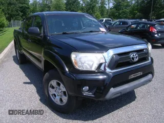 2014 Toyota Tacoma with VIN 5TFMU4FN1EX025469, listed as a IAAI auction lot 42737718 with 166,467 mi miles and . Bid and sale history available at DreamBid. Image 1.