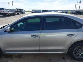 2014 Volkswagen Passat S with VIN 1VWAP7A37EC026387, listed as a IAAI auction lot 42253575 with 227,878 mi miles and . Bid and sale history available at DreamBid. Image 14.