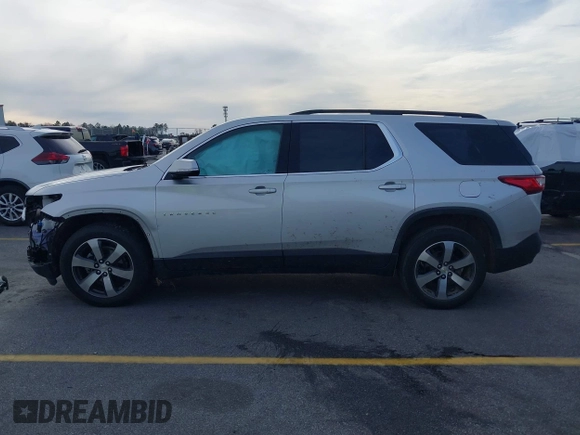 2019 Chevrolet Traverse LT with VIN 1GNERHKW6KJ140036, listed as a IAAI auction lot 41610615 with 98,685 mi miles and . Bid and sale history available at DreamBid. Image 14.