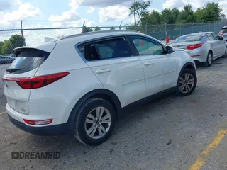 2017 Kia Sportage LX with VIN KNDPM3ACXH7298783, listed as a IAAI auction lot 40378233 with 77,423 mi miles. Bid and sale history available at carsss.com. Image 4.