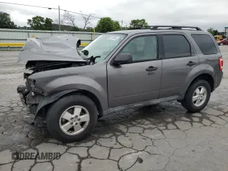 2012 Ford Escape XLT with VIN 1FMCU0D73CKA20143, listed as a Copart auction lot 63111075 with 136,942 mi miles and Salvage title. Bid and sale history available at DreamBid. Image 1.