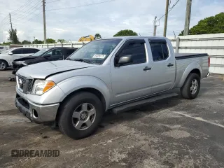 2007 Nissan Frontier LE with VIN 1N6AD09U17C442693, listed as a Copart auction lot 64089275 with 184,461 mi miles and Salvage title. Bid and sale history available at DreamBid. Image 1.