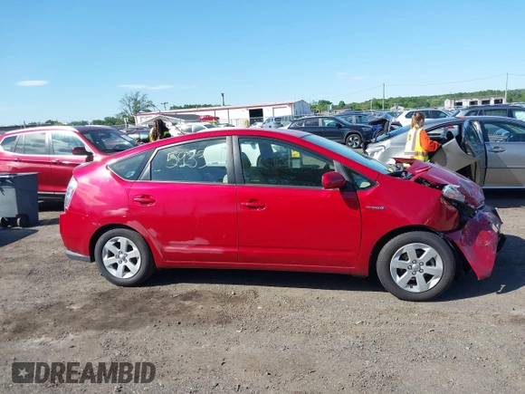 2007 Toyota Prius z VIN JTDKB20U577558459, wystawiony jako IAAI lot #42265933 z przebiegiem 104 286 mil mil oraz . Historia ofert i sprzedaży dostępna na DreamBid. Obrazek 13.