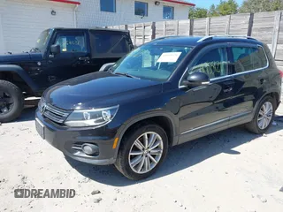 2012 Volkswagen Tiguan SEL with VIN WVGAV7AX2CW529232, listed as a IAAI auction lot 41955121 with 164,885 mi miles and . Bid and sale history available at DreamBid. Image 17.