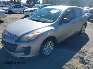 2012 Mazda Mazda3 i Touring with VIN JM1BL1L87C1609141, listed as a IAAI auction lot 41871418 with 125,253 mi miles. Bid and sale history available at carsss.com. Image 2.
