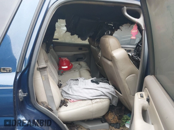 2002 Chevrolet Tahoe LT z VIN 1GNEC13Z82R238343, wystawiony jako IAAI lot #41796657 z przebiegiem Nie podano mil oraz . Historia ofert i sprzedaży dostępna na DreamBid. Obrazek 8.