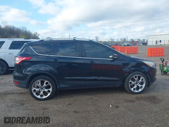 2015 Ford Escape Titanium with VIN 1FMCU9J96FUC11476, listed as a IAAI auction lot 41967914 with 149,341 mi miles. Bid and sale history available at carsss.com. Image 13.
