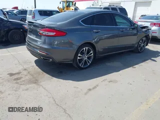 2019 Ford Fusion Titanium with VIN 3FA6P0D90KR109985, listed as a IAAI auction lot 41993329 with Not provided miles and . Bid and sale history available at DreamBid. Image 4.