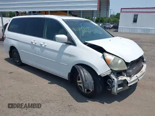 2007 Honda Odyssey EX-L z VIN 5FNRL38717B400727, wystawiony jako IAAI lot #42247147 z przebiegiem 199 430 mil mil oraz . Historia ofert i sprzedaży dostępna na DreamBid. Obrazek 1.