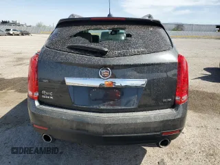 2015 Cadillac SRX Luxury Collection z VIN 3GYFNBE34FS541817, wystawiony jako Copart lot #58386685 z przebiegiem 51 731 mil mil oraz Szkoda całkowita • Salvage title. Historia ofert i sprzedaży dostępna na DreamBid. Obrazek 6.