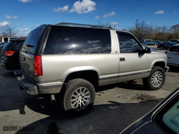 1999 Chevrolet Tahoe with VIN 3GNEK18R9XG152347, listed as a Copart auction lot 80785154 with 301,018 mi miles and Salvage Title. Bid and sale history available at carsss.com. Image 3.