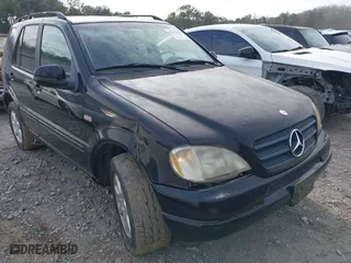 2000 Mercedes-Benz M-Class with VIN 4JGAB72E9YA208069, listed as a IAAI auction lot 41530528 with 155,967 mi miles. Bid and sale history available at carsss.com. Image 6.