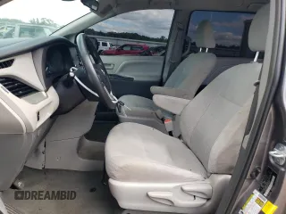 2019 Toyota Sienna L with VIN 5TDZZ3DC8KS006907, listed as a Copart auction lot 70310274 with 73,234 mi miles and Salvage Title. Bid and sale history available at carsss.com. Image 7.