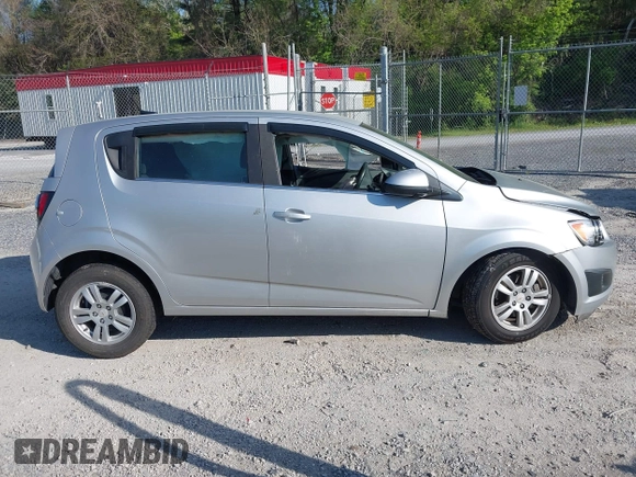 2012 Chevrolet Sonic LT with VIN 1G1JC6SH5C4167574, listed as a IAAI auction lot 42133100 with 59,473 mi miles and . Bid and sale history available at DreamBid. Image 13.
