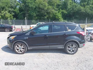 2013 Ford Escape SE z VIN 1FMCU9GX5DUA19887, wystawiony jako IAAI lot #42580986 z przebiegiem 169 407 mil mil oraz . Historia ofert i sprzedaży dostępna na DreamBid. Obrazek 14.