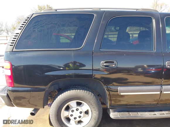 2003 Chevrolet Tahoe LS with VIN 1GNEC13V63R245581, listed as a IAAI auction lot 41599241 with 234,028 mi miles. Bid and sale history available at carsss.com. Image 21.