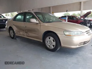 2002 Honda Accord EX z VIN 1HGCG16502A068461, wystawiony jako IAAI lot #42192811 z przebiegiem 194 183 mil mil oraz . Historia ofert i sprzedaży dostępna na DreamBid. Obrazek 1.
