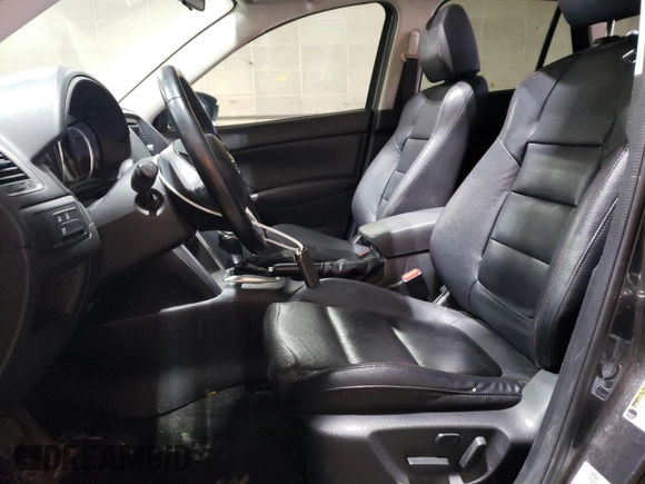 2015 Mazda CX-5 Grand Touring with VIN JM3KE4DY1F0454713, listed as a Copart auction lot 48548285 with 132,454 mi miles and Salvage Title. Bid and sale history available at DreamBid. Image 7.