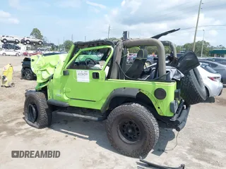 2004 Jeep Wrangler Sahara z VIN 1J4FA59S44P704878, wystawiony jako IAAI lot #42226255 z przebiegiem 88 886 mil mil oraz . Historia ofert i sprzedaży dostępna na DreamBid. Obrazek 15.