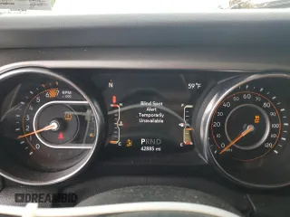 2020 Jeep Wrangler Unlimited Sahara with VIN 1C4HJXENXLW224455, listed as a Copart auction lot 58184255 with 42,885 mi miles and Salvage title. Bid and sale history available at DreamBid. Image 9.
