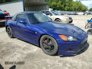 2000 Honda S2000 z VIN JHMAP114XYT000619, wystawiony jako Copart lot #64161254 z przebiegiem 124 573 mil mil oraz Szkody całkowita. Historia ofert i sprzedaży dostępna na DreamBid. Obrazek 4.