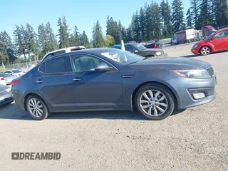2015 Kia Optima EX with VIN 5XXGN4A77FG368704, listed as a IAAI auction lot 42174674 with 128,963 mi miles. Bid and sale history available at carsss.com. Image 13.