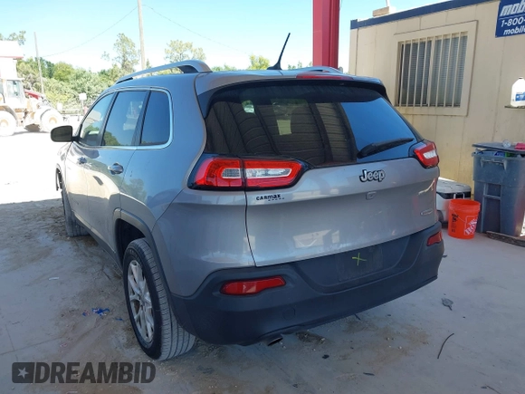 2015 Jeep Cherokee Latitude with VIN 1C4PJLCB1FW770806, listed as a IAAI auction lot 41887226 with 71,268 mi miles and . Bid and sale history available at DreamBid. Image 3.