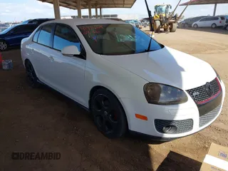 2009 Volkswagen Jetta GLI z VIN 3VWBJ71K49M048591, wystawiony jako IAAI lot #41974209 z przebiegiem 172 642 mil mil oraz . Historia ofert i sprzedaży dostępna na DreamBid. Obrazek 1.