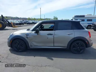 2019 MINI Hardtop 4 Door Cooper S with VIN WMWXU3C5XK2H55160, listed as a IAAI auction lot 42024249 with 49,944 mi miles and . Bid and sale history available at DreamBid. Image 14.