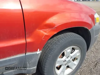 2006 Ford Escape XLT with VIN 1FMCU93136KB88998, listed as a IAAI auction lot 42410306 with 186,892 mi miles and . Bid and sale history available at DreamBid. Image 6.