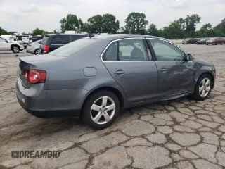 2008 Volkswagen Jetta SE with VIN 3VWRM71K08M037186, listed as a Copart auction lot 60173795 with 186,594 mi miles and Salvage title. Bid and sale history available at DreamBid. Image 3.