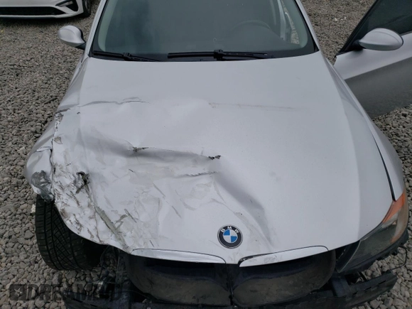 2006 BMW 3 Series 325i with VIN WBAVB13506KR59910, listed as a Copart auction lot 54754715 with 107,181 mi miles and Salvage title. Bid and sale history available at DreamBid. Image 11.