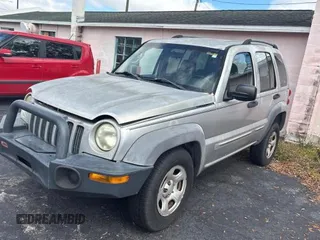 2002 Jeep Liberty Sport with VIN 1J4GL48K72W243074, listed as a Copart auction lot 47081875 with 127,178 mi miles and Clean Title. Bid and sale history available at carsss.com. Image 2.