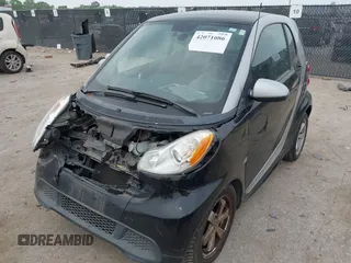 2013 Smart fortwo Pure with VIN WMEEJ3BA5DK620493, listed as a IAAI auction lot 42071086 with 85,883 mi miles and . Bid and sale history available at DreamBid. Image 2.