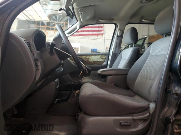 2003 Ford Escape XLT Popular 2 with VIN 1FMYU93193KB87078, listed as a Copart auction lot 59018205 with 222,082 mi miles and Salvage title. Bid and sale history available at DreamBid. Image 7.