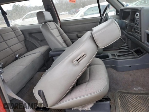 1993 Jeep Cherokee Sport with VIN 1J4FJ67S6PL580133, listed as a Copart auction lot 43230005 with 122,173 mi miles and Salvage Title. Bid and sale history available at carsss.com. Image 11.