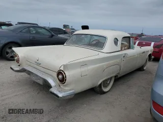 1957 Ford Thunderbird z VIN D7FH394065, wystawiony jako Copart lot #76660654 z przebiegiem 85 758 mil mil oraz Szkody całkowita. Historia ofert i sprzedaży dostępna na DreamBid. Obrazek 3.
