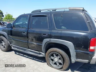 2001 Chevrolet Tahoe LT with VIN 1GNEK13T81R202598, listed as a IAAI auction lot 42007381 with 188,172 mi miles. Bid and sale history available at carsss.com. Image 14.