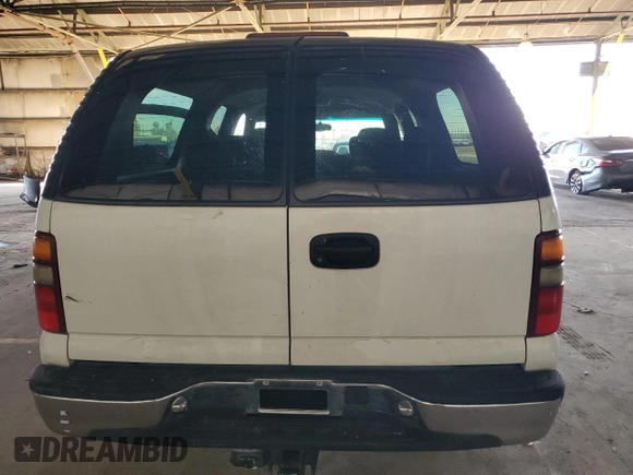 2000 Chevrolet Suburban LS with VIN 3GNEC16T9YG109043, listed as a Copart auction lot 77372784 with 228,042 mi miles and Salvage title. Bid and sale history available at DreamBid. Image 6.