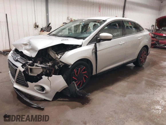 2012 Ford Focus SE with VIN 1FAHP3F21CL284921, listed as a IAAI auction lot 42054351 with 164,377 mi miles and . Bid and sale history available at carsss.com. Image 2.