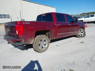 2017 Chevrolet Silverado 1500 LTZ with VIN 3GCUKSEC6HG182143, listed as a IAAI auction lot 41596135 with 169,120 mi miles. Bid and sale history available at carsss.com. Image 4.