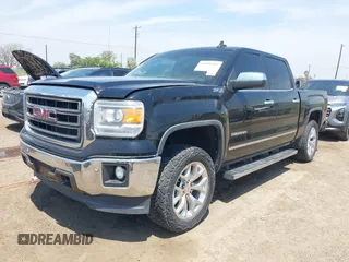 2015 GMC Sierra 1500 SLT with VIN 3GTU2VEC6FG328135, listed as a IAAI auction lot 42056412 with 151,458 mi miles and . Bid and sale history available at DreamBid. Image 2.