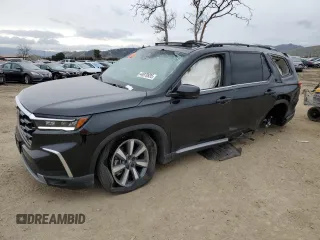 2024 Honda Pilot Touring with VIN 5FNYG1H75RB036660, listed as a Copart auction lot 44970935 with 9,435 mi miles and Salvage Title. Bid and sale history available at carsss.com. Image 1.