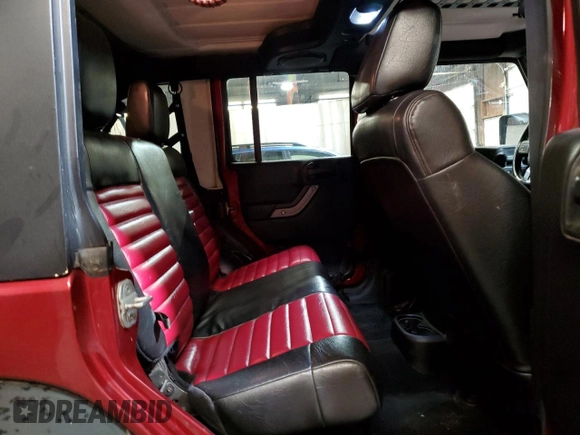 2012 Jeep Wrangler Unlimited Sport z VIN 1C4BJWDG8CL282181, wystawiony jako Copart lot #53863375 z przebiegiem 92 984 mil mil oraz Szkoda całkowita • Salvage title. Historia ofert i sprzedaży dostępna na DreamBid. Obrazek 11.